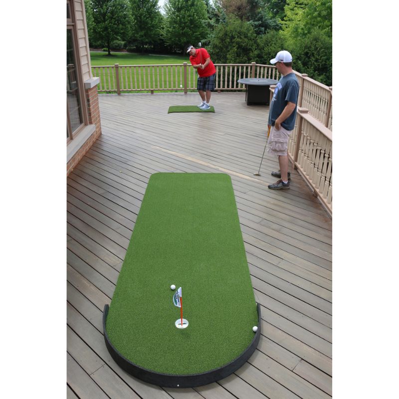 Big Moss Golf Commander Patio Series Putting & Chipping Green in 15x3 foot option with golfer chipping.