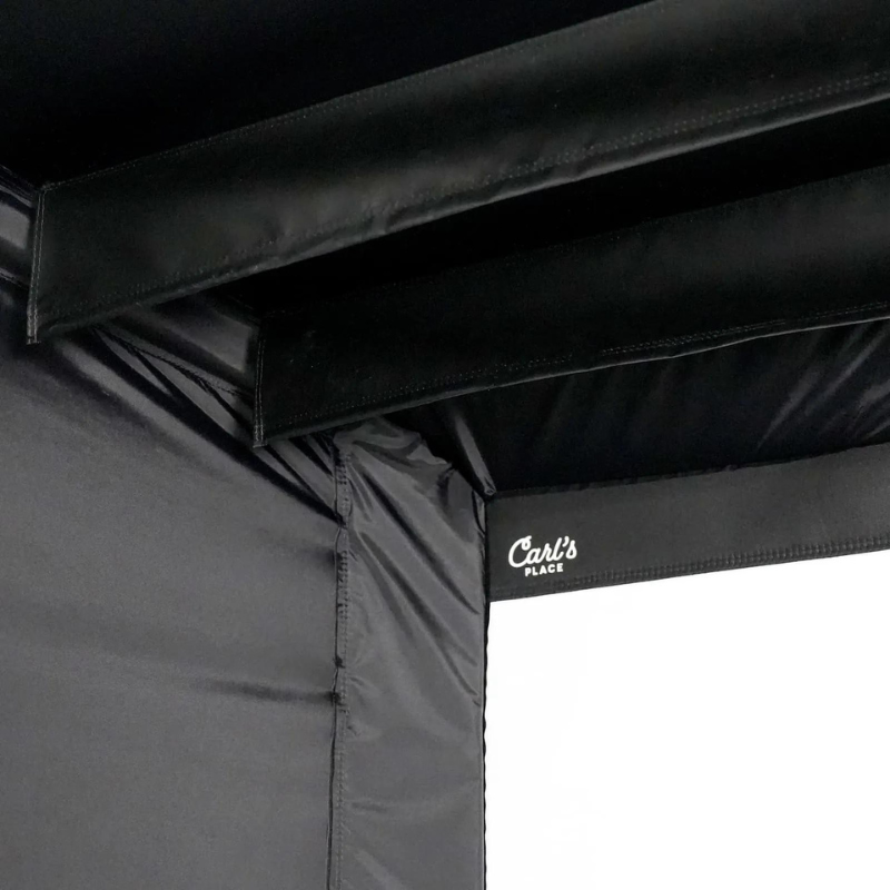 Carl's Place Safety Baffles shown on the C-Series DIY Golf Simulator Enclosure Package with Impact Screen.