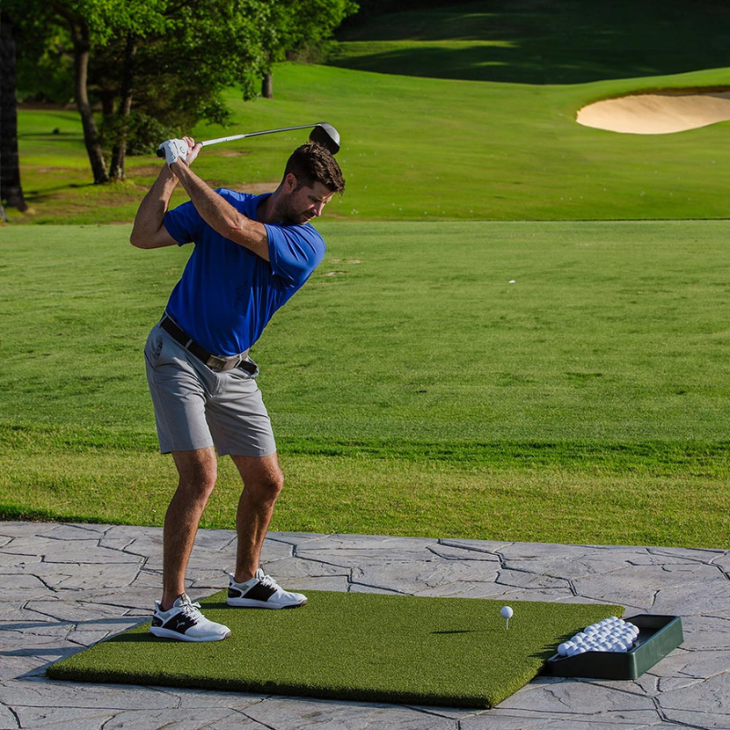Real Feel Country Club Elite Golf Mat 5x5 foot with golfer hitting driver.