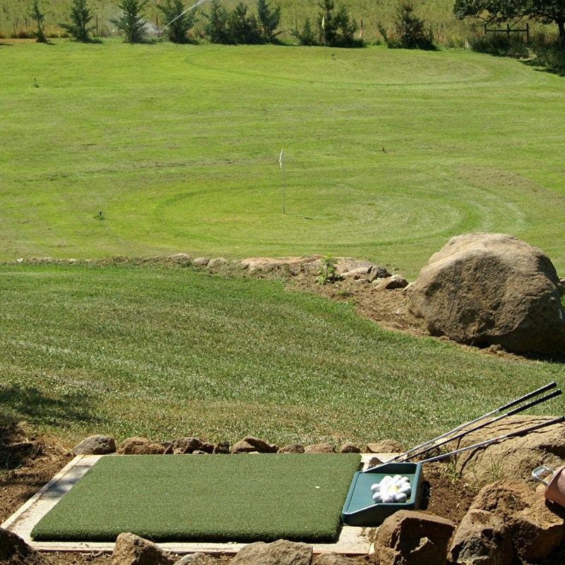 Real Feel Country Club Elite Golf Mat 4x5 foot with a target green and flag stick.